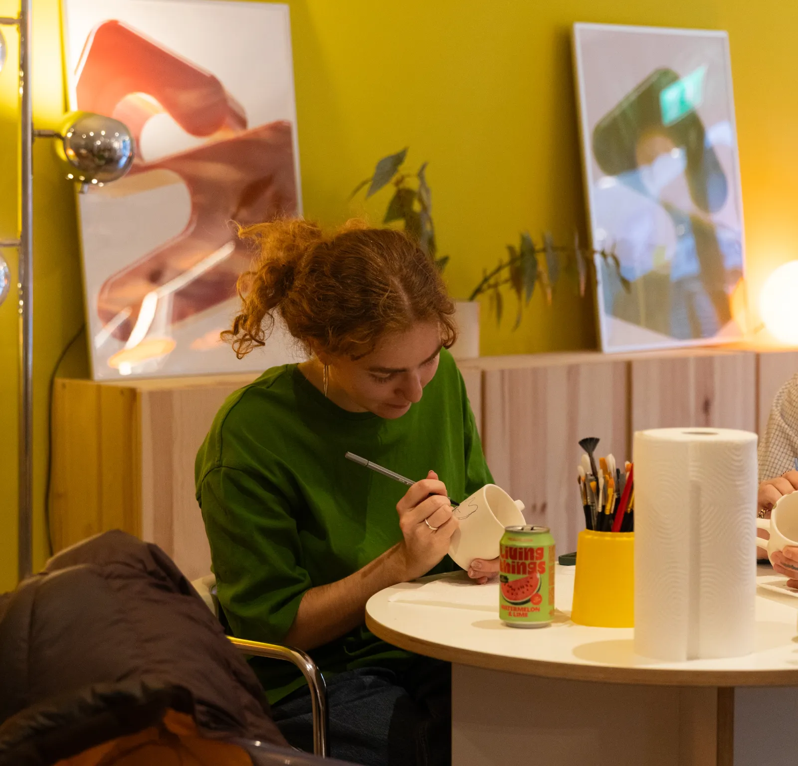 female-painting-in-space-studio.jpg
